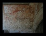 The indistinct remains of the painting in the north transept of the church at Northmoor.